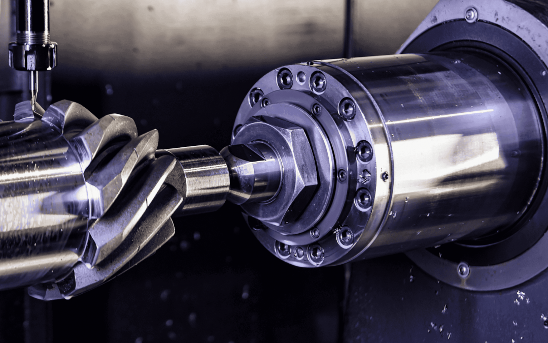 Close-up of a CNC milling machine machining a helical gear shaft with a precision cutting tool
